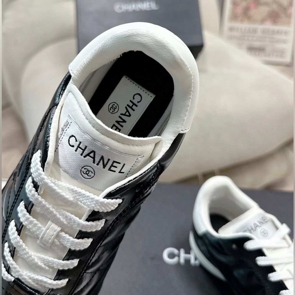 Women's Chanel Black Quilted Patent Leather White Lace-Up Sneakers - Picture 6 of 7